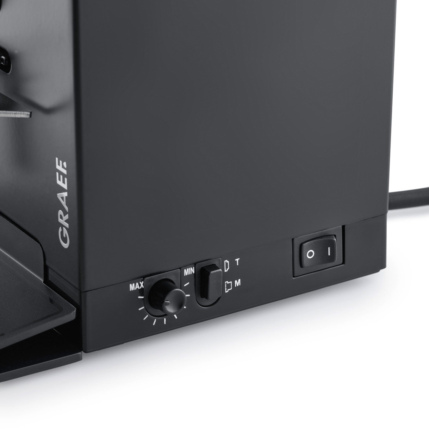 Machine à café Graef avec cadran, interrupteur et boutons pour les réglages.